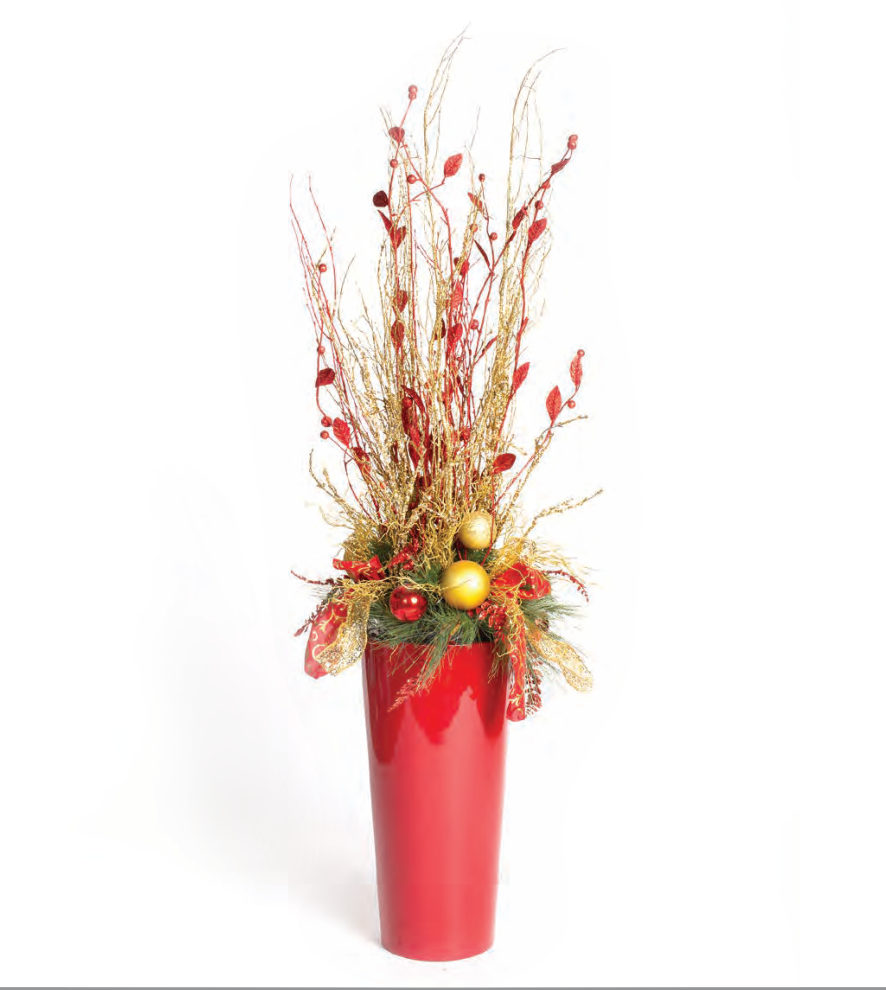 Red and gold branch display in a red planter