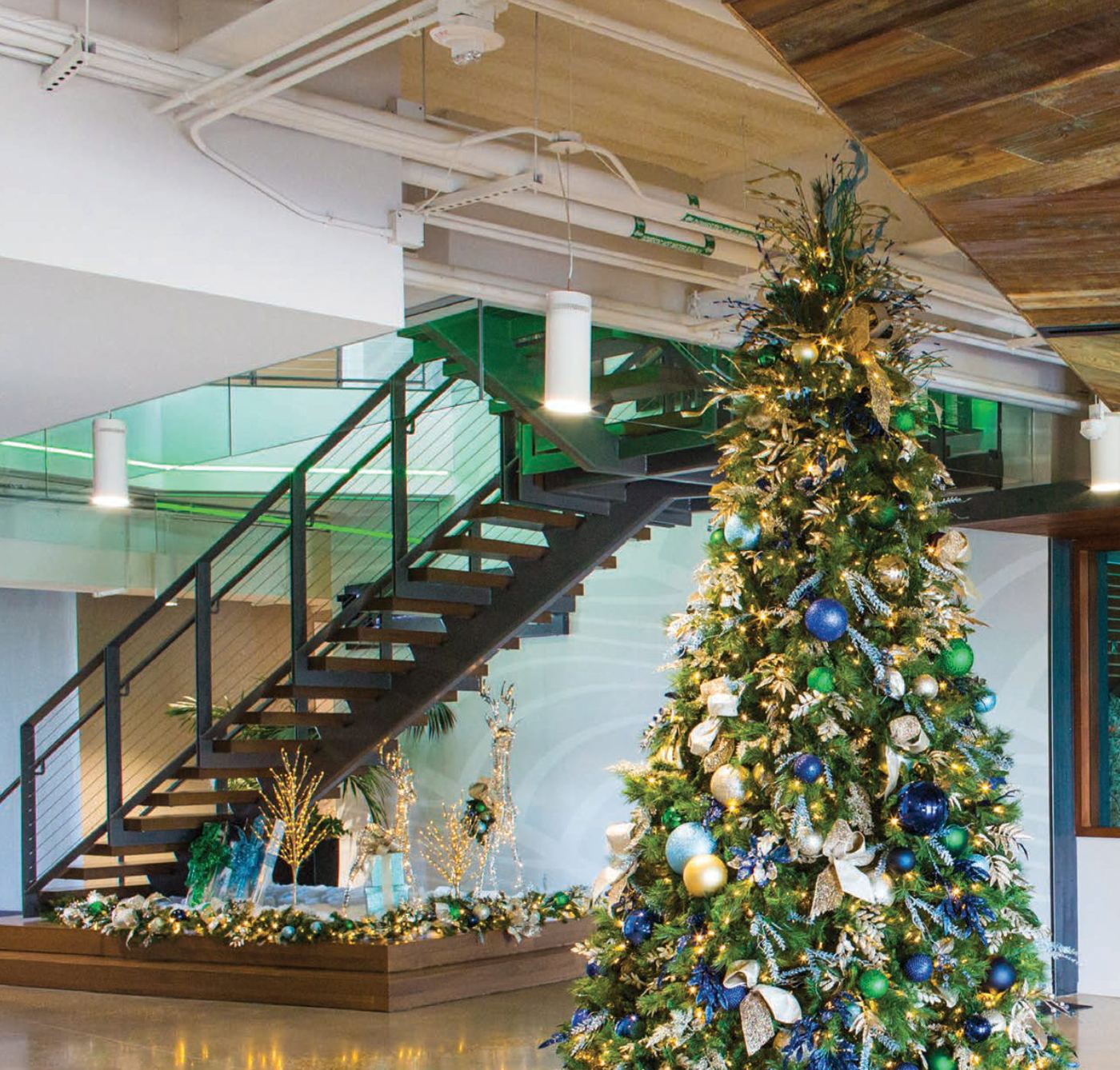 Decorated holiday tree in a modern office lobby